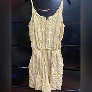 yellow romper with pockets